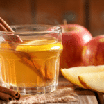 Apple cider vinegar weight loss drink with cinnamon, lemon, and fresh apples